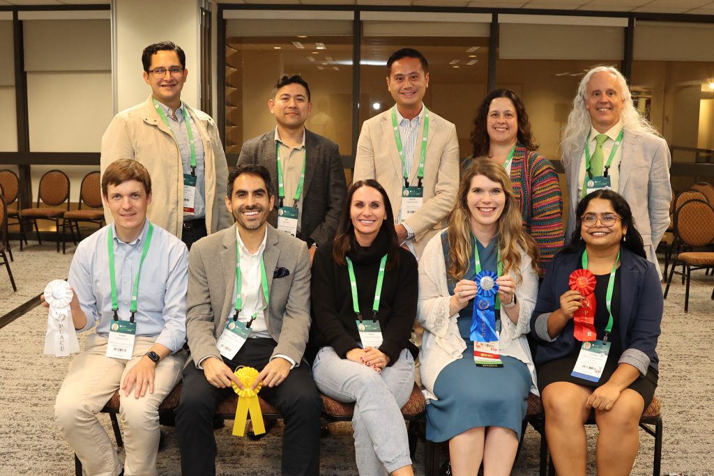 The poster judges together with chair and vice-chair of the Oral Papers & Posters Subcommittee, Michael Peterson, MD, PhD, FACLP, and VaKara Meyer Karre, MD.